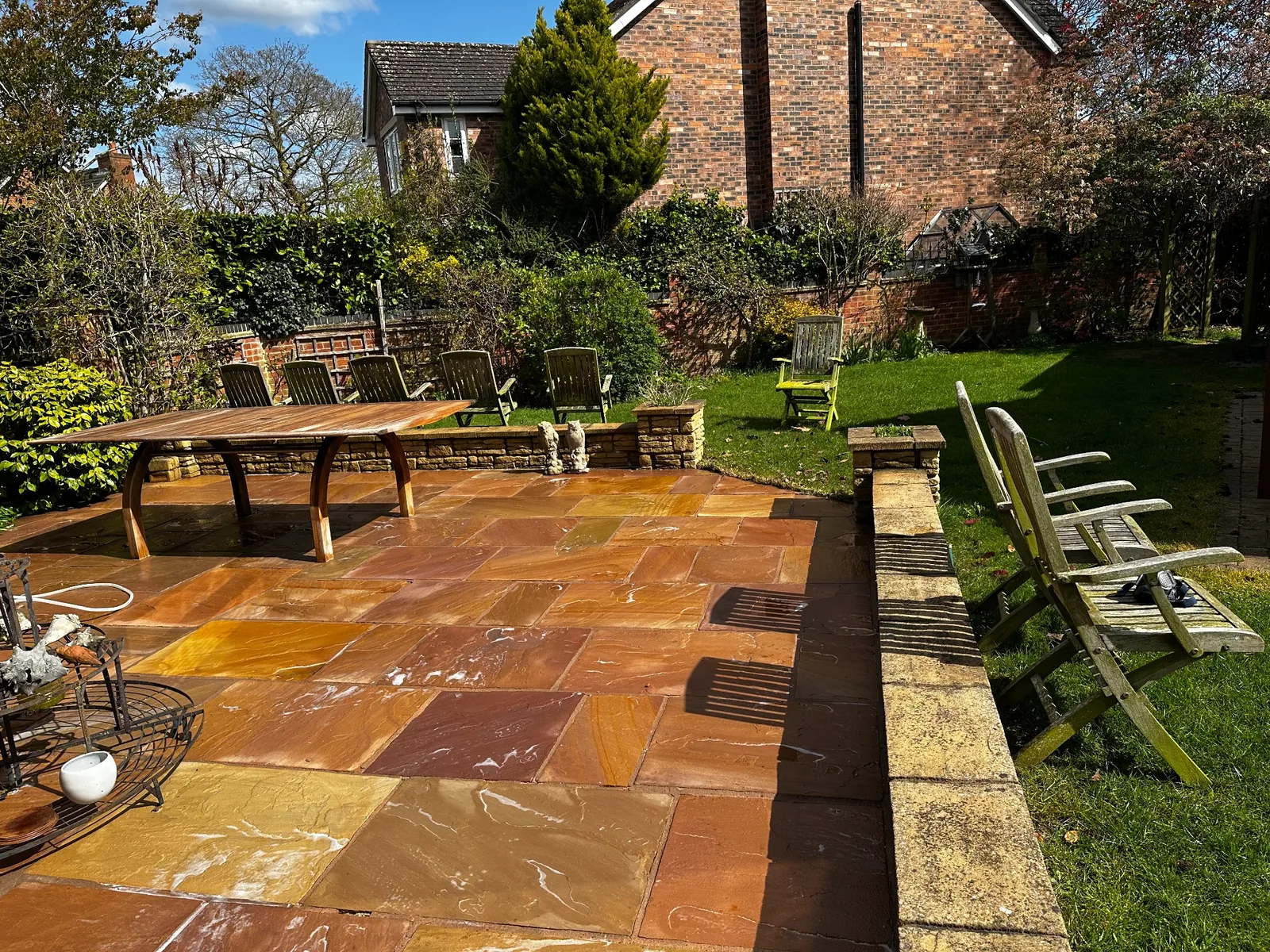 Professionally cleaned Indian sandstone patio for customers in Altrincham, Greater Manchester