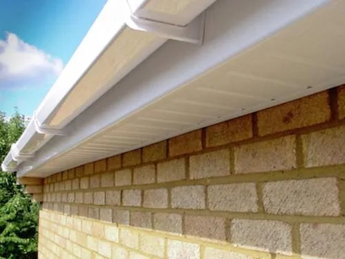 Clean white soffit and fascia detail - soffit and fascia cleaning in Altrincham