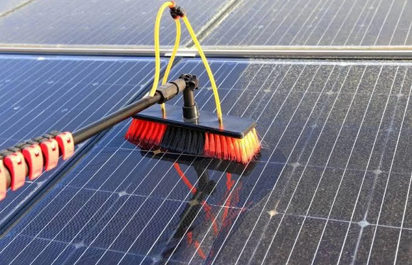 Solar panels being cleaned with purified water