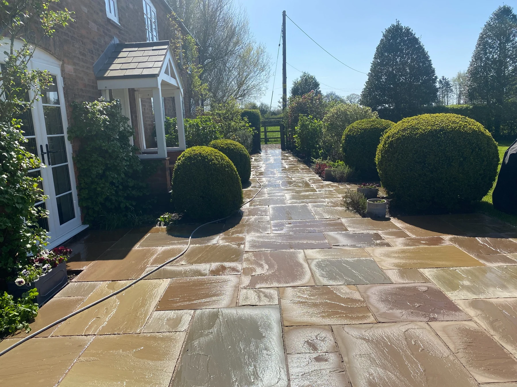 Real Proline Exterior Cleaning patio cleaning result showing restored paving