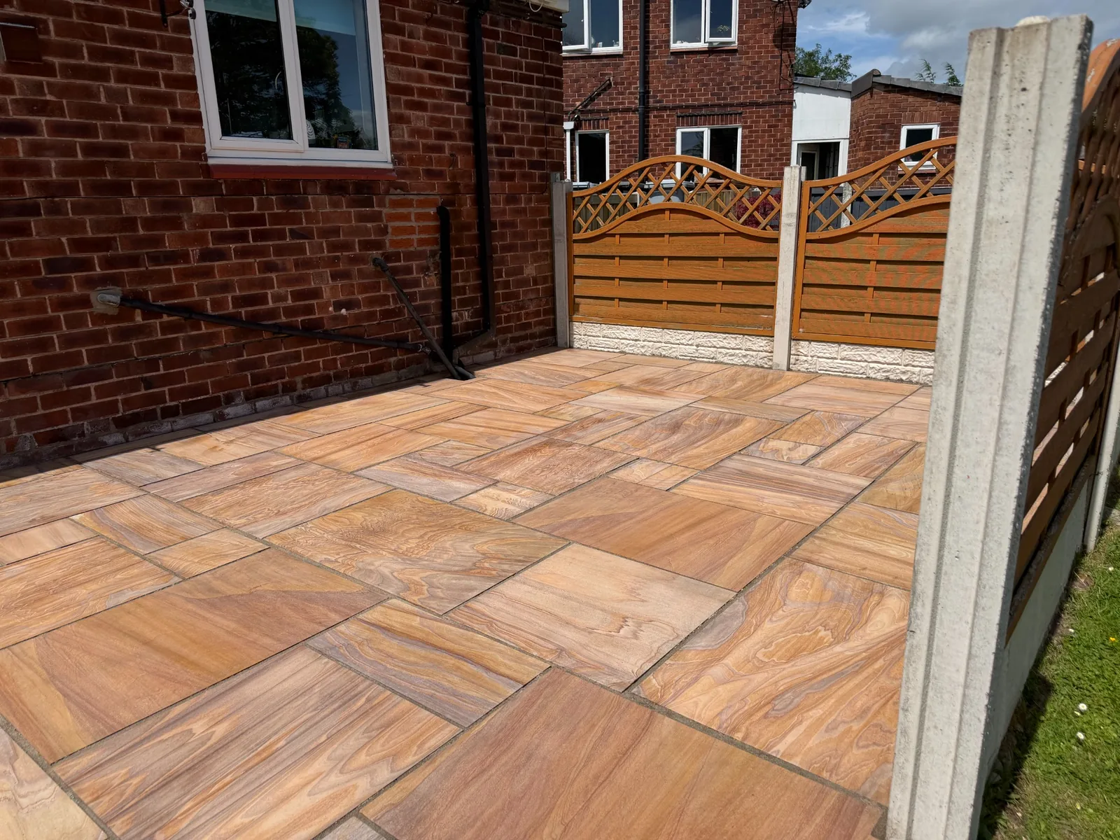 Professionally cleaned Indian sandstone patio serving Runcorn by Proline Exterior Cleaning